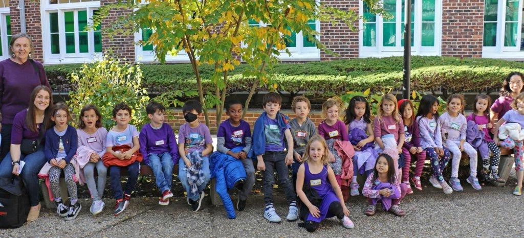 Students dressed in violet for solidarity event