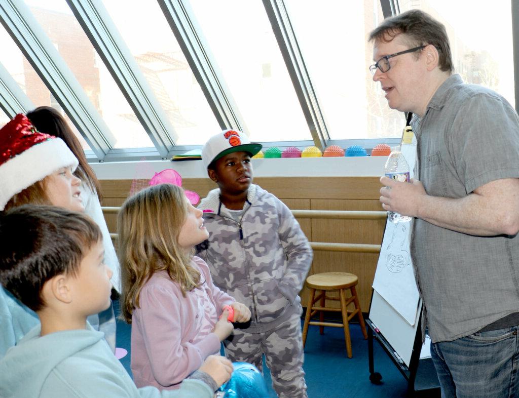 John Patrick Green with students