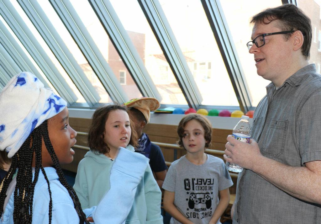 John Patrick Green with students