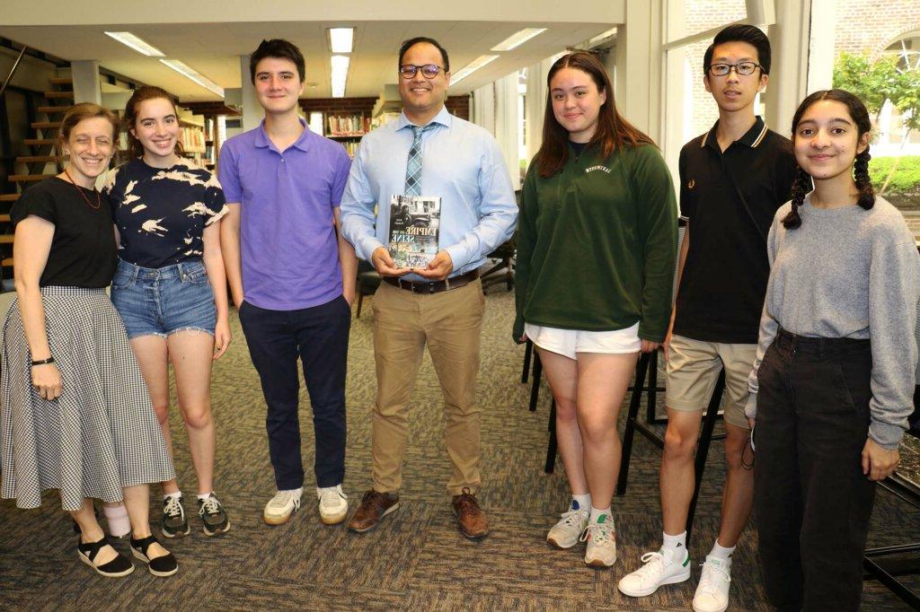  Dr. Amit Prakash with members of Poly's History Club and Dr. Virginia Dillon