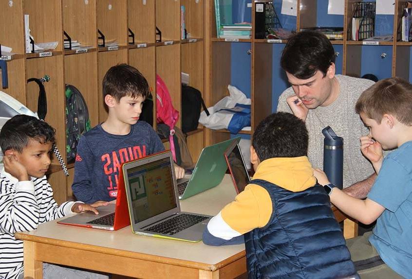 Lower School After School play - children with computers